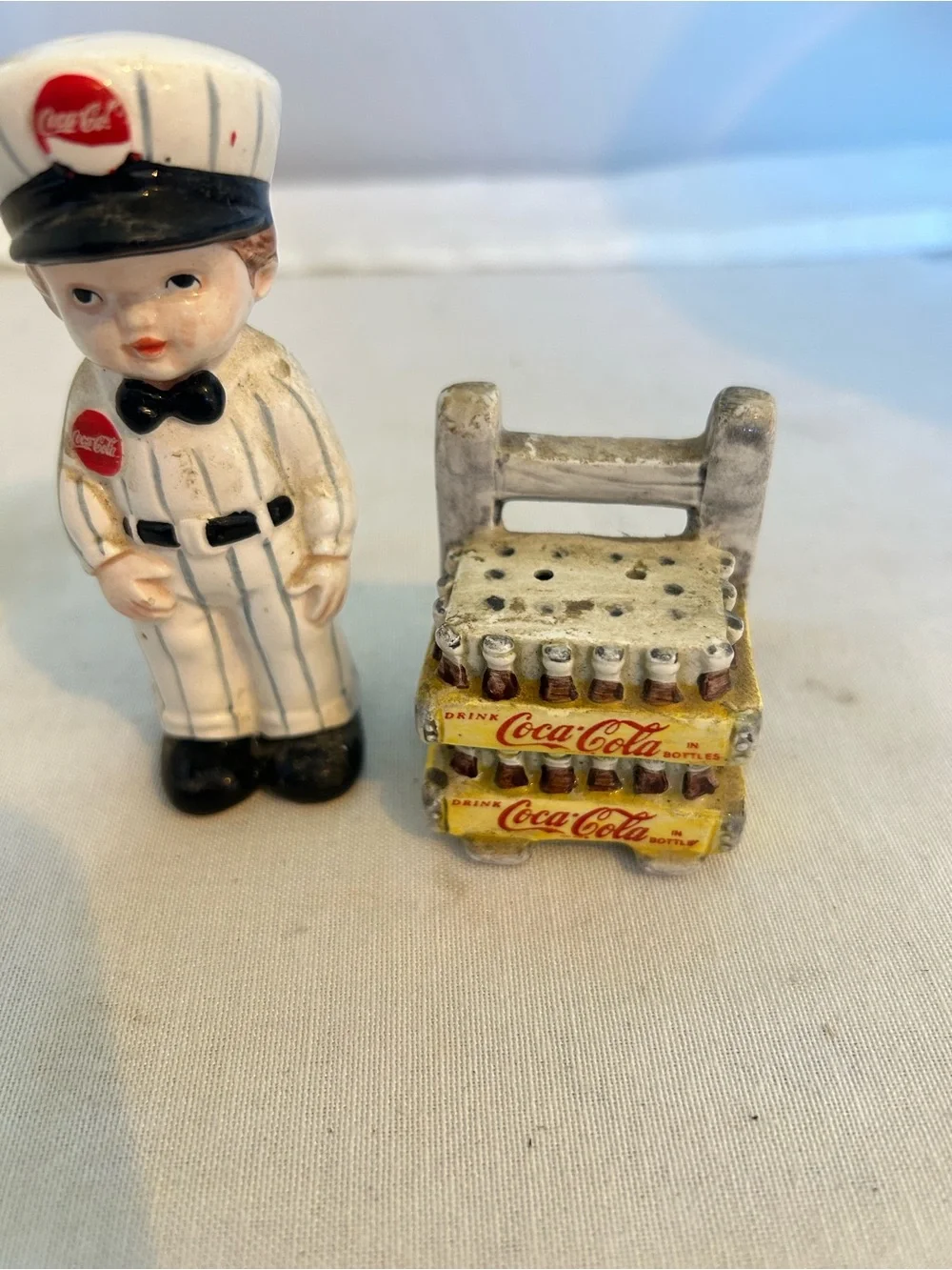 Coca Cola delivery man salt and pepper shakers with Yellow Bottle Crates